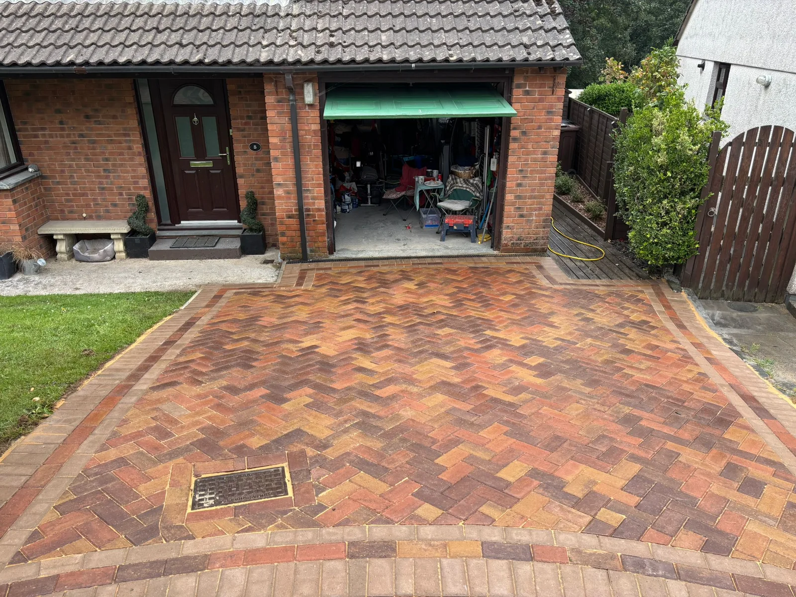 Paved driveway where falls and edges matter by Total Paving Solutions